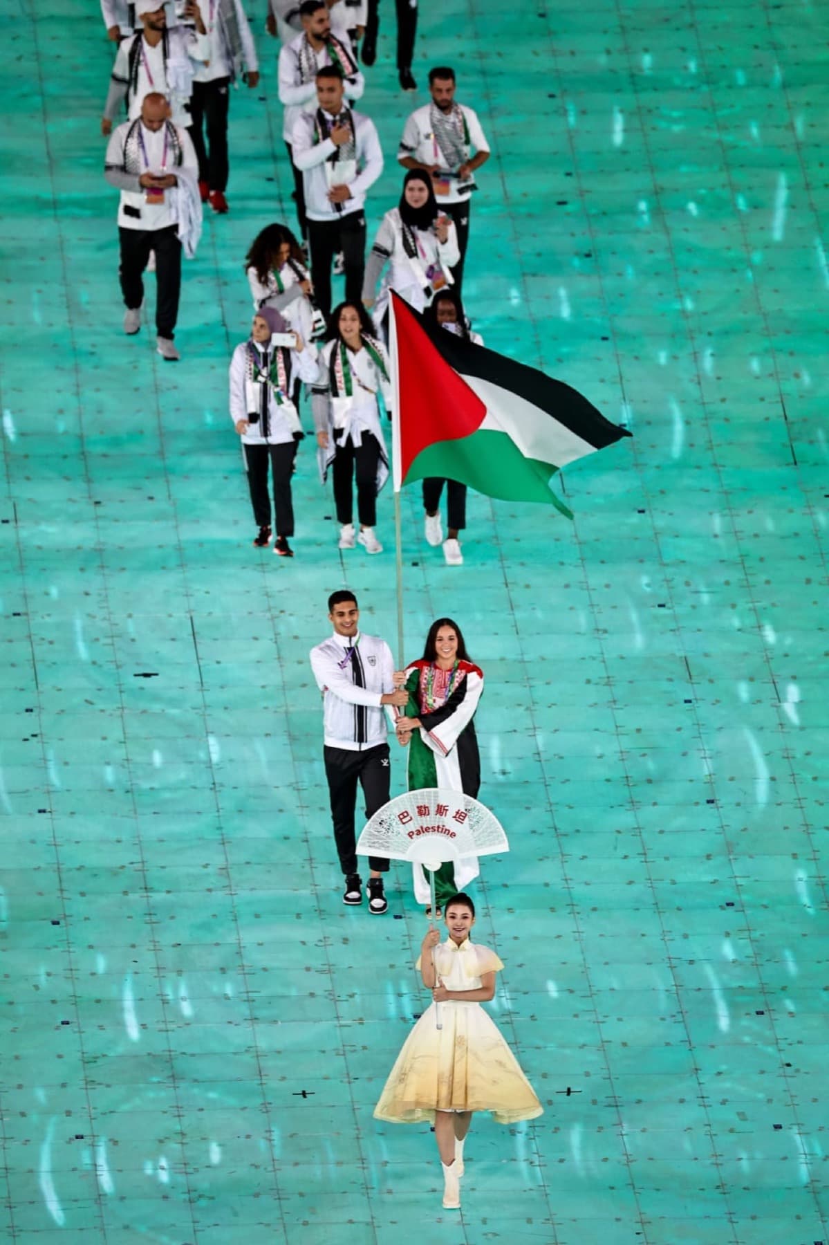 Palestinian flag leading the team during the Olympic ceremony