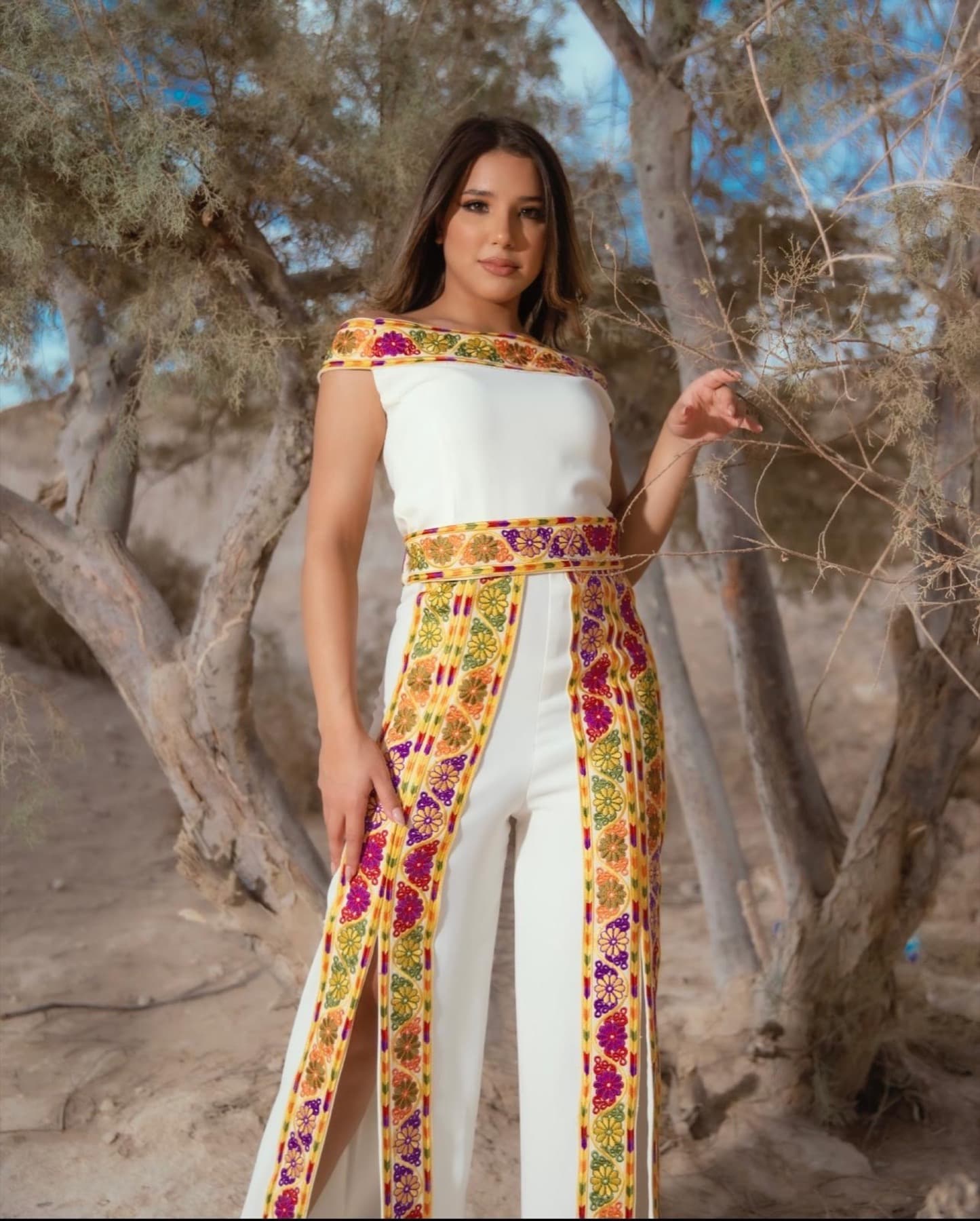 White garment with Palestinian floral embroidery