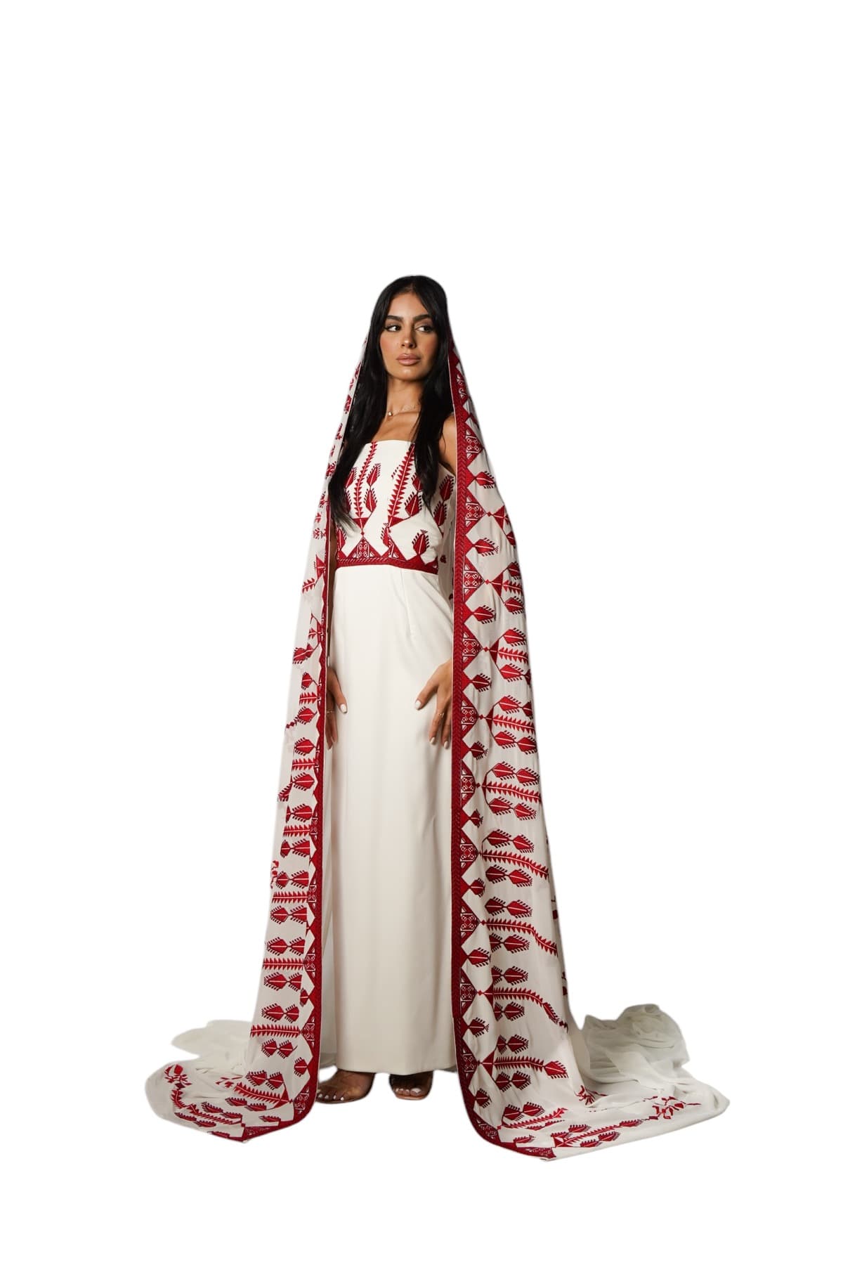 Bride in ivory dress with red Palestinian embroidered veil
